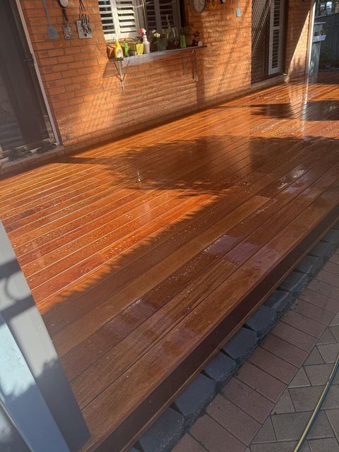 Freshly oiled hardwood deck boards
